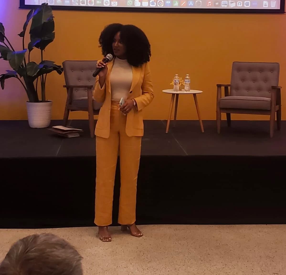 Stephanie on stage speaking